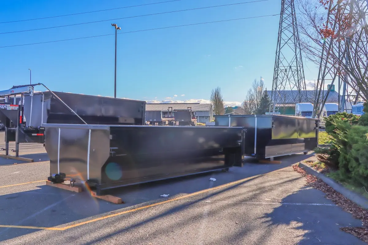 Roll-off dumpster ready for waste disposal at job site for Yard Waste Dumpster Rental in Naples